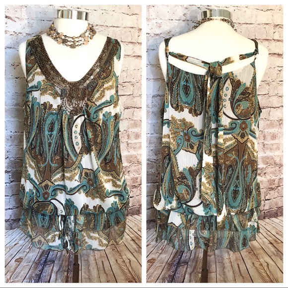 Earthtone colored mixed media sleeveless top